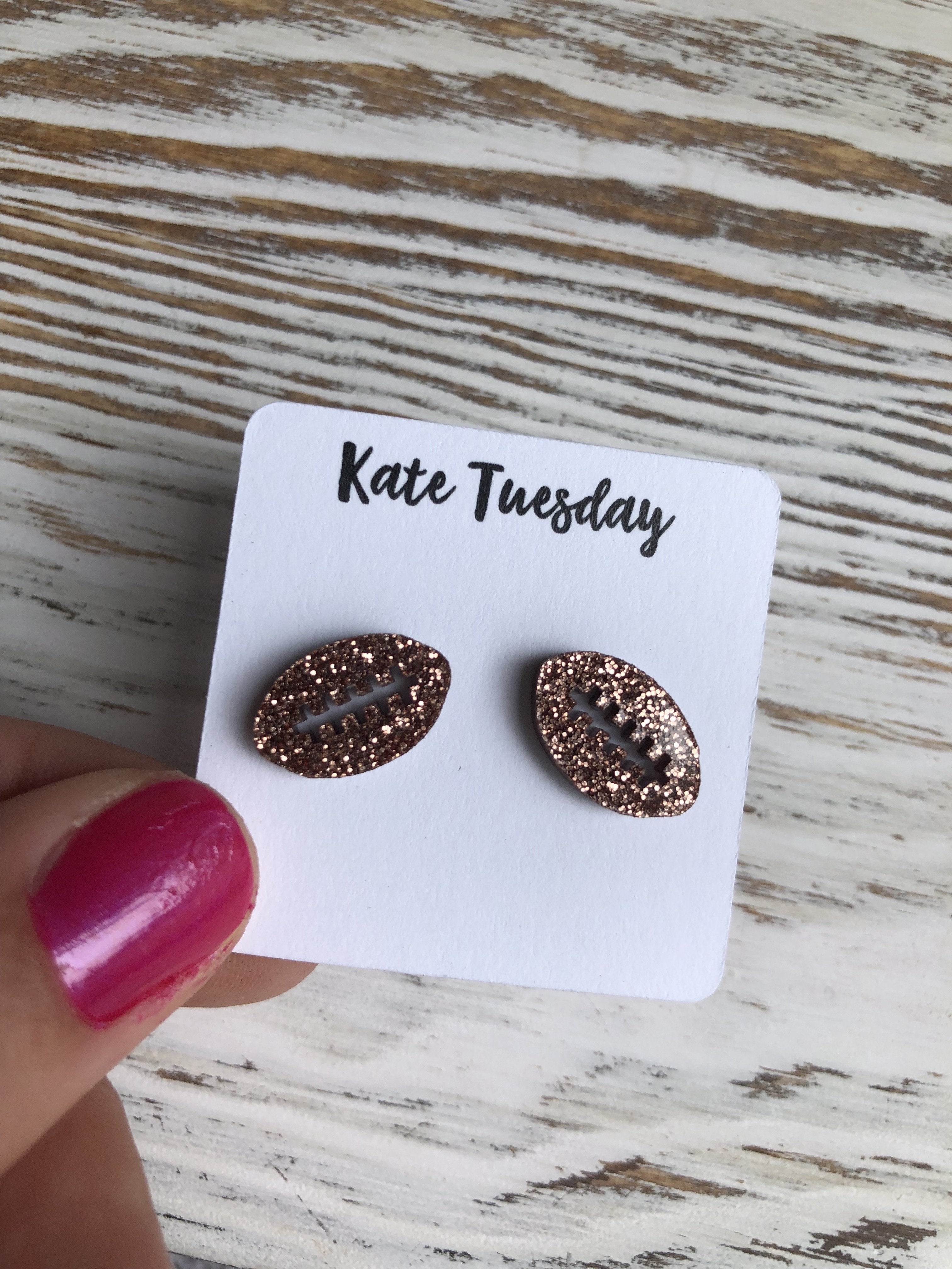 ONLINE EXCLUSIVE! Rose Gold Football Sparkly Stud Acrylic Earrings